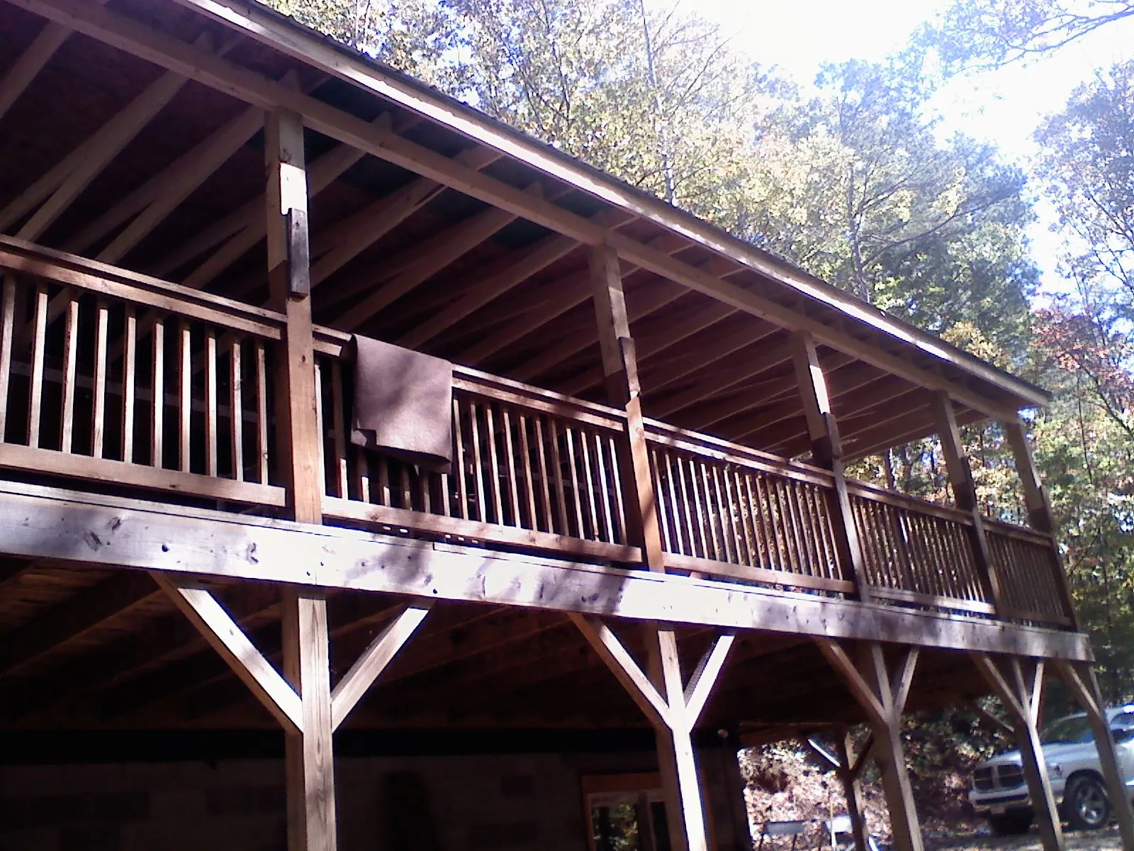 Timber framing under a new elevated porch and deck — Roof Leak Repair in Lynnville by Roofing Brothers